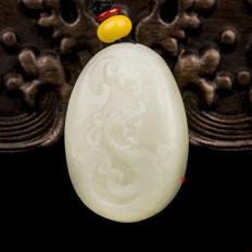 新疆和田玉黄皮白玉籽玉挂件 祥龙 30克
